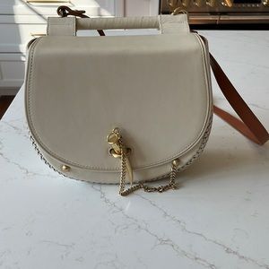 Like New Sancia white cream leather tan crossbody purse bag with gold. Fall